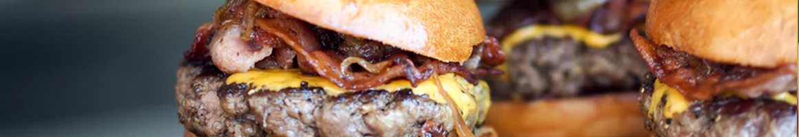 Eating American (Traditional) Burger at The Canteen Tap House and Tavern restaurant in Breckenridge, CO.